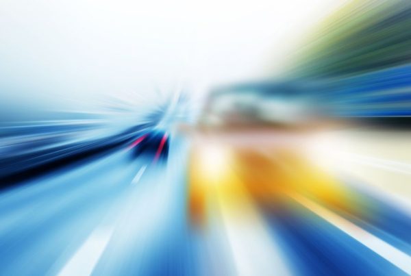 Blurred vision of a road with cars