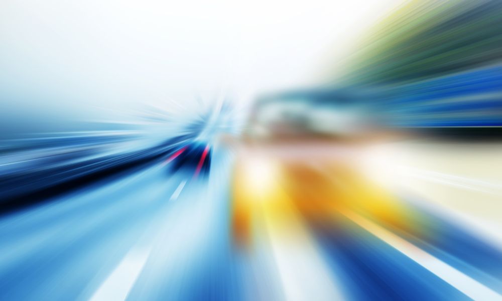 Blurred vision of a road with cars